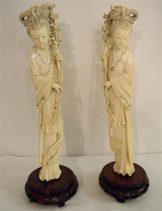 Appraisal: Chinese th century a facing pair of standing ivory meijen