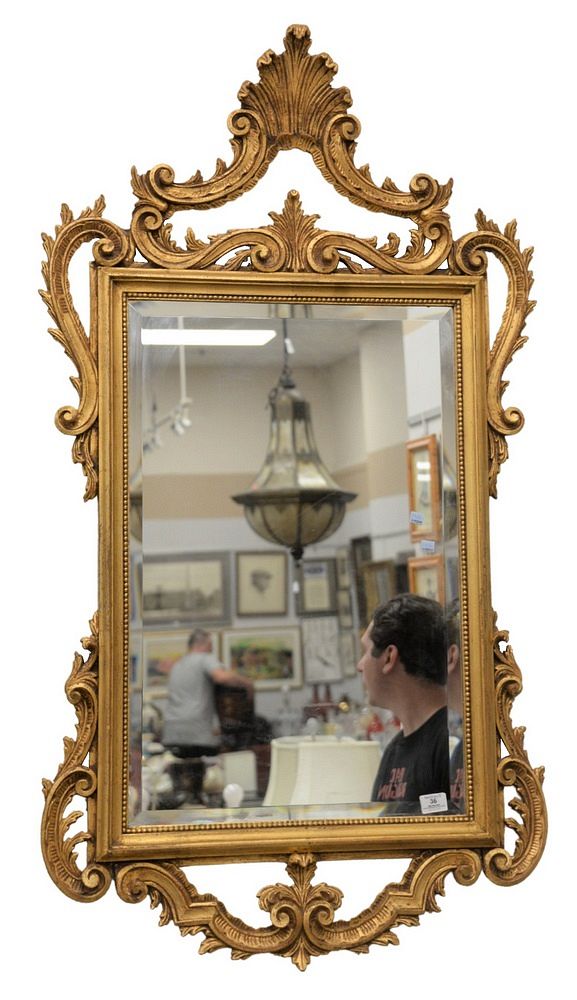 Appraisal: Chippendale style mirror with gold frame height inches width inches