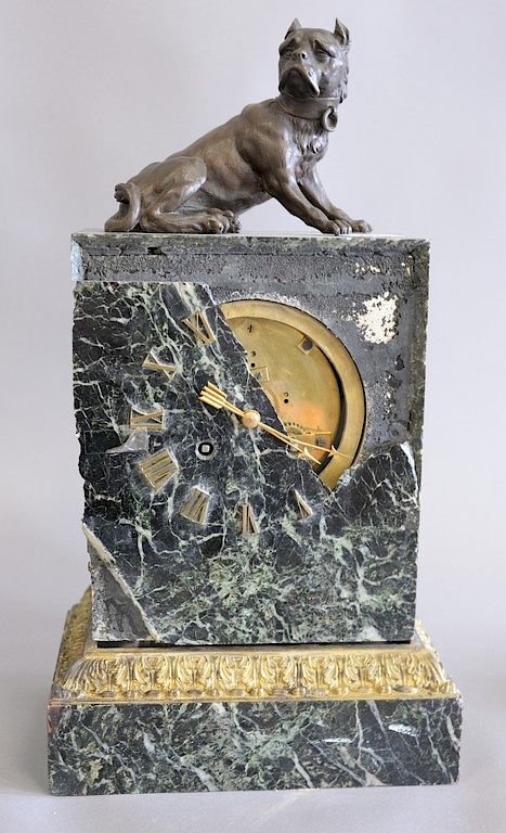 Appraisal: Napoleon III marble clock mounted with bronze dog Napoleon III