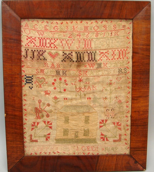 Appraisal: Sampler dated features numbers and alphabet in upper half lower