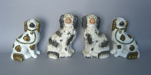 Appraisal: Two pair Staffordshire spaniels th c h and h