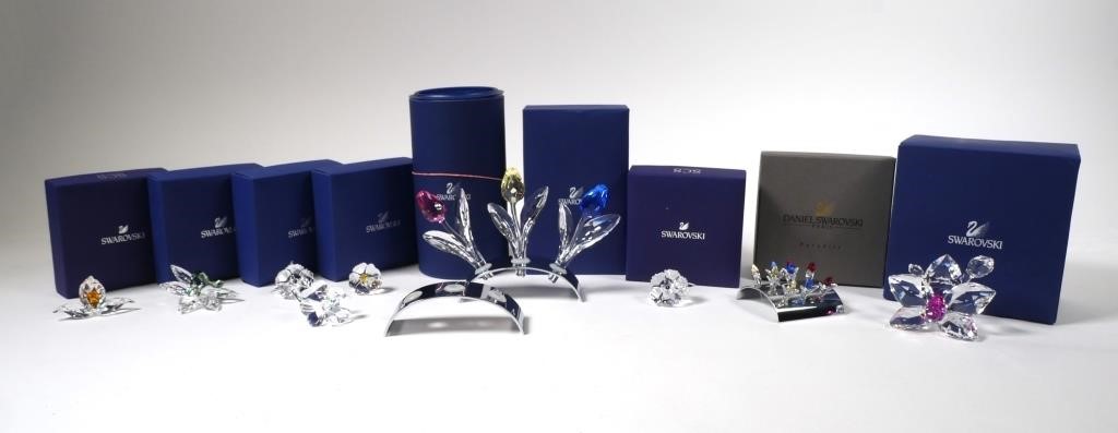 Appraisal: Group of floral Swarovski crystal figurines in various colors styles