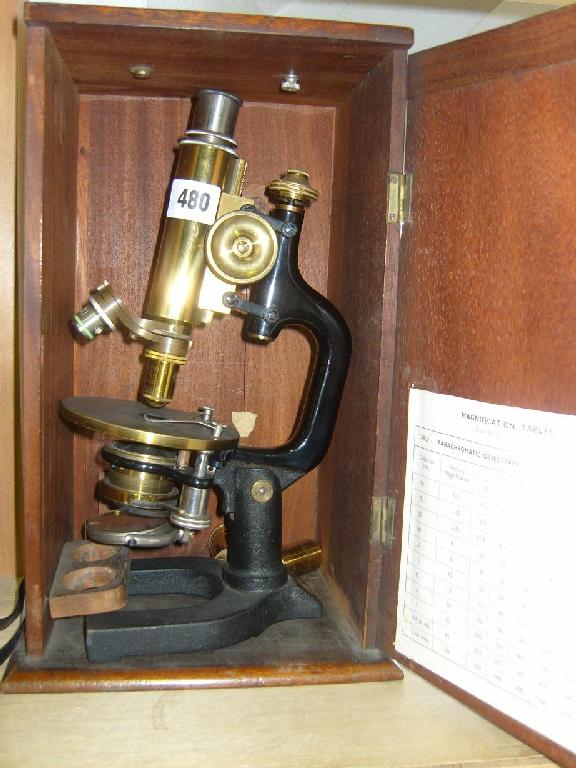 Appraisal: A brass black enamelled microscope by C Reichert of Wien