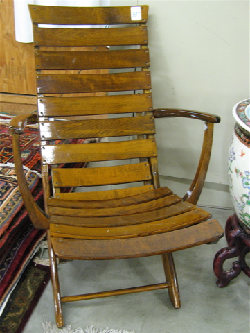 Appraisal: A PAIR OF FOLDING WOOD DECK CHAIRS th century each