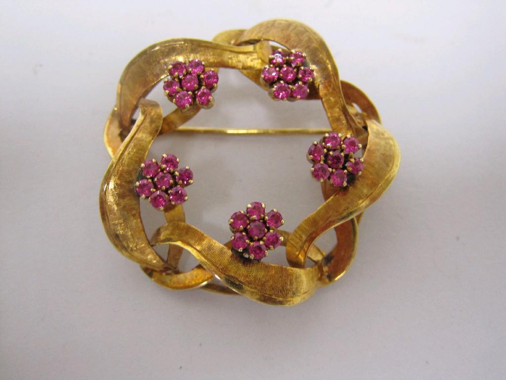 Appraisal: A gold floral circular Brooch set numerous rubies