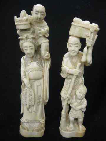 Appraisal: Pair of Chinese Carved Ivory Figurines man woman each with