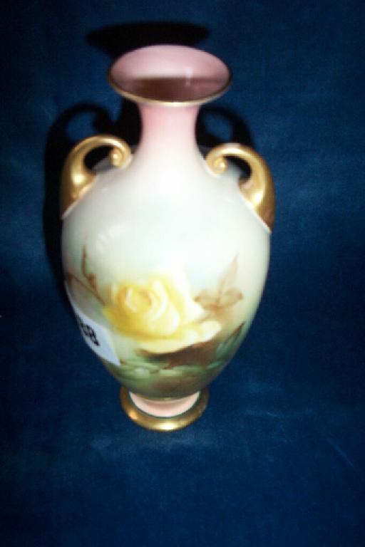 Appraisal: A Royal Worcester two-handled vase with painted yellow and pink