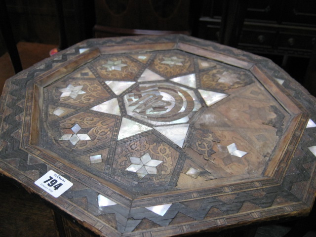 Appraisal: An early th century Turkish mother of pearl inlaid octagonal