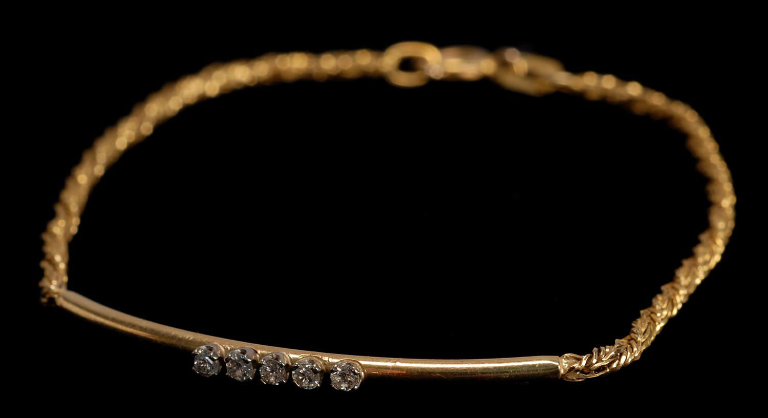 Appraisal: ITALIAN KT GOLD AND DIAMOND BRACELET With five small diamonds