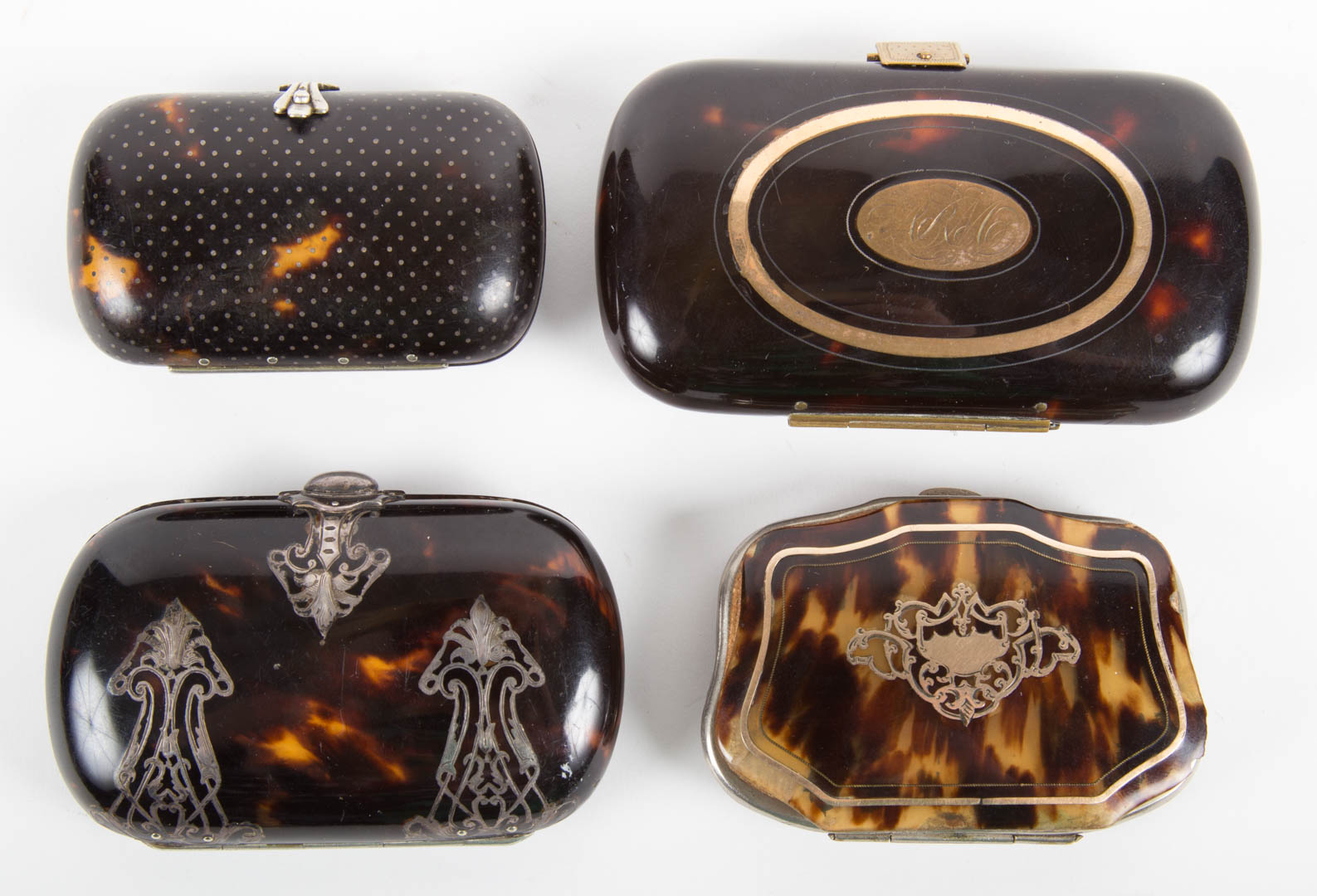 Appraisal: Four Victorian inlaid tortoiseshell coin purses second half- th century