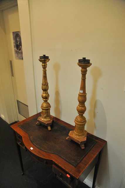 Appraisal: A PAIR OF TALL TH CENTURY TURNED AND CARVED CANDLESTICKS