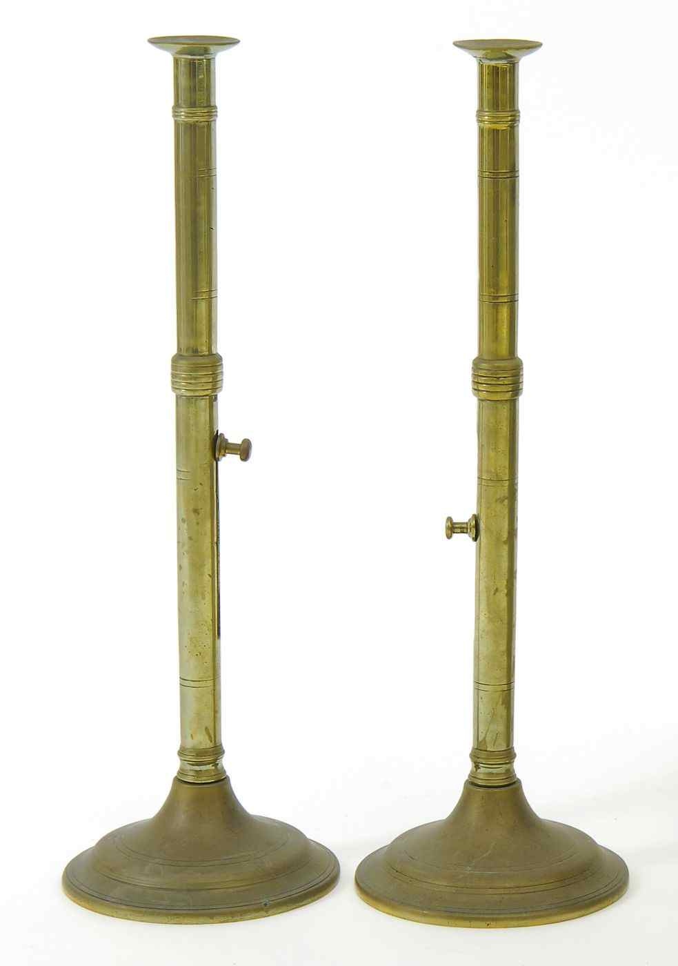 Appraisal: PAIR OF ADJUSTABLE BRASS CANDLESTICKSMade for conversion to lamps Height