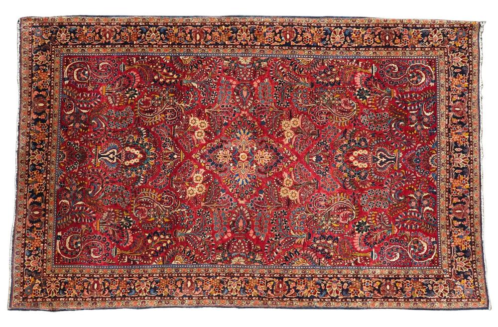 Appraisal: Sarouk Persian hand knotted rug in a rich burgundy pattern