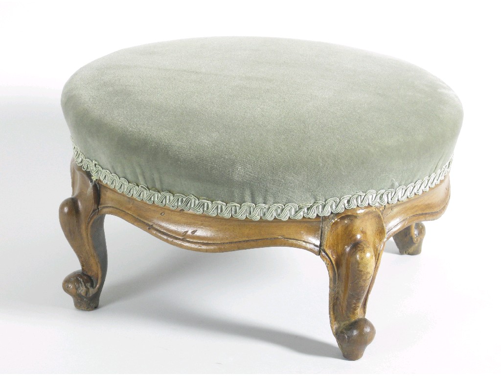 Appraisal: A Victorian walnut framed circular Footstool with dralon upholstery on