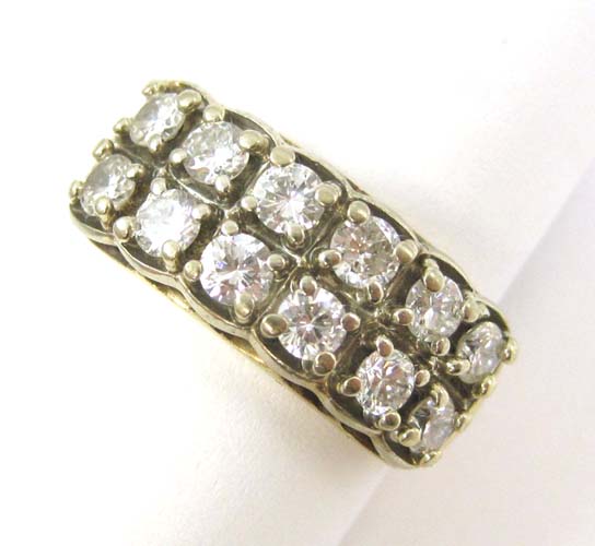 Appraisal: DIAMOND AND FOURTEEN KARAT GOLD RING set with twelve round-cut