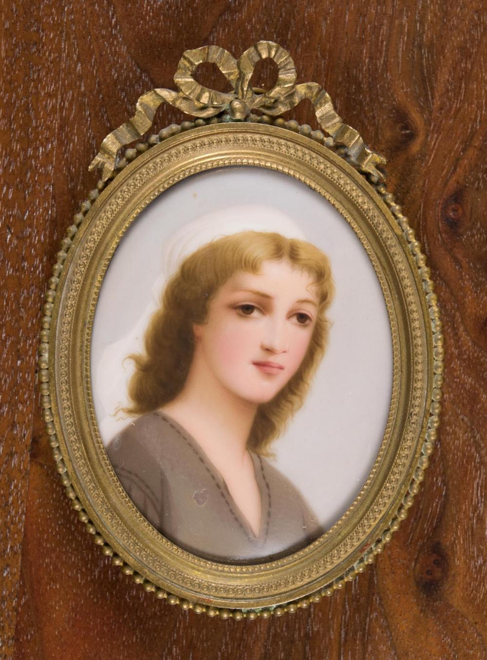 Appraisal: FRENCH SCHOOL MINIATURE OIL ON OVAL PORCELAIN portrait of young