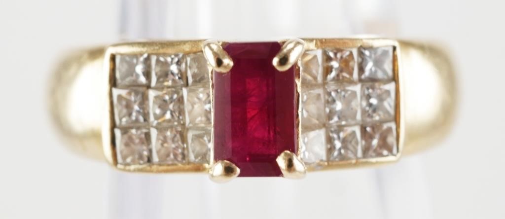 Appraisal: K yellow gold ring with a ruby center stone and