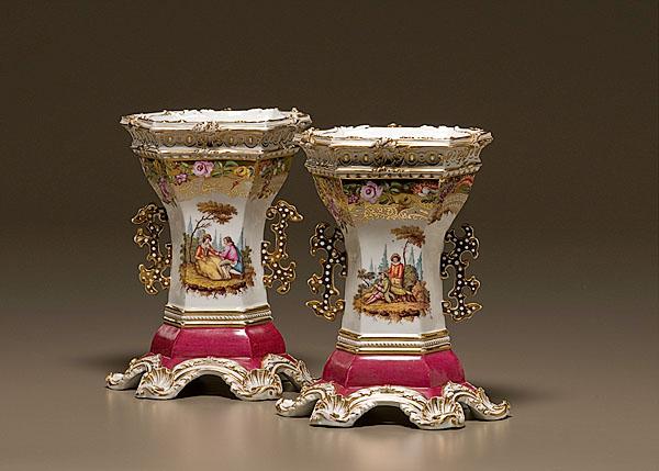 Appraisal: PORCELAIN GARNITURE VASES th century Continental A pair of two-handled