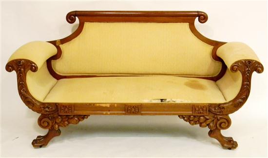 Appraisal: Empire rolled arm sofa mahogany mahogany veneer elaborate carving including