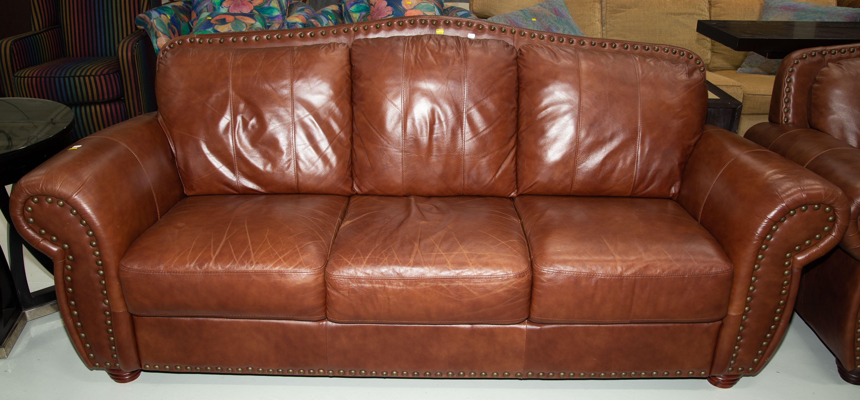 Appraisal: LEATHER UPHOLSTERED SOFA Late th century in H