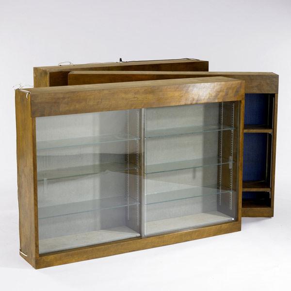 Appraisal: CURIO CABINETS Three hanging display cases two with glass shelves