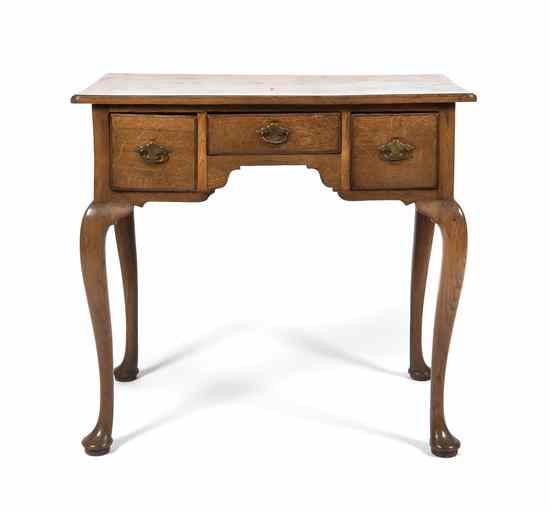 Appraisal: An English Queen Anne Oak Lowboy circa - having a