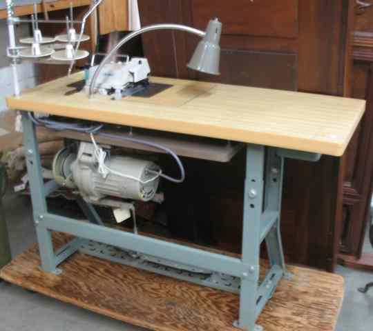 Appraisal: JUKI INDUSTRIAL SERGER AND WORK TABLE a four thread high-speed