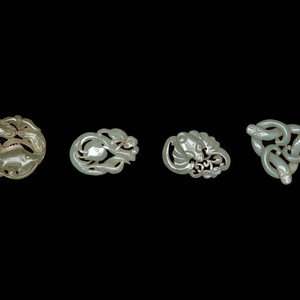 Appraisal: Four Chinese Celadon Jade Carved 'Animal' Pendants depicting a fish