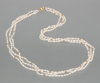 Appraisal: A Pretty Freshwater Baroque Pearl Necklace k yellow gold fluted