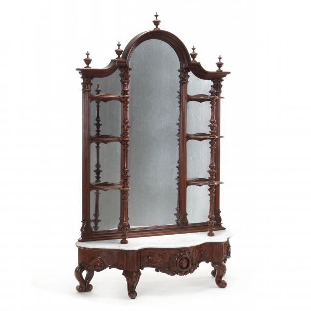 Appraisal: AMERICAN ROCOCO REVIVAL CARVED WALNUT AND MARBLE MIRRORED ETAGERE Late