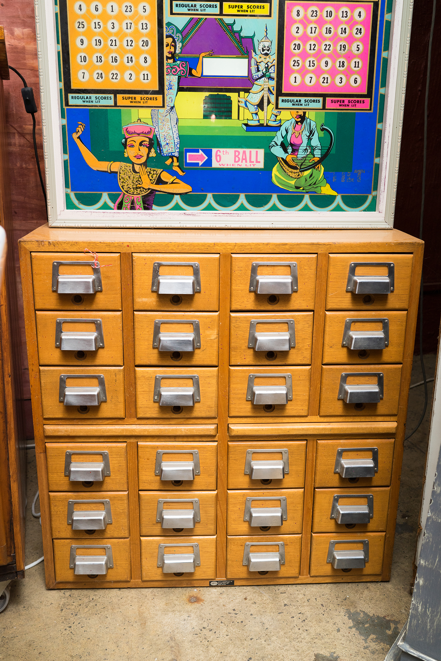 Appraisal: TWENTY FOUR DRAWER CARD FILING UNIT Timber with metal fittings