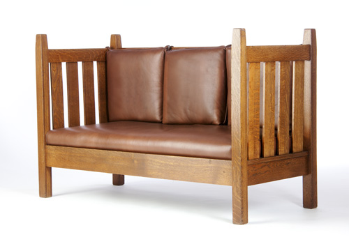 Appraisal: ARTS CRAFTS Even arm settee in the style of Gustav