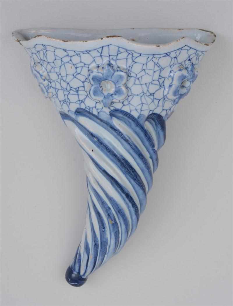 Appraisal: LIVERPOOL DELFT BLUE AND WHITE CORNUCOPIUM WALL POCKET With spiral