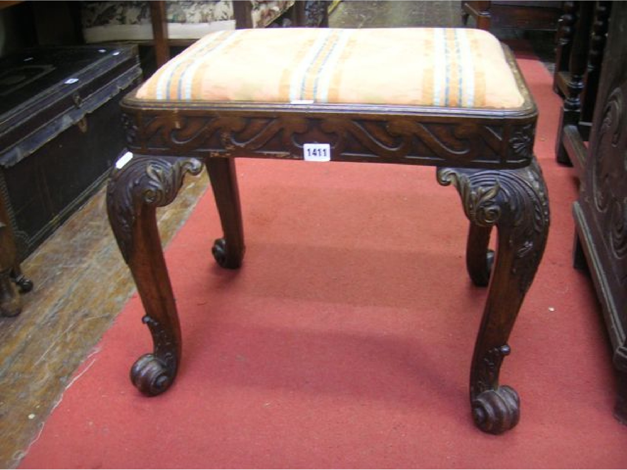 Appraisal: An th century style centre stool in mahogany raised on