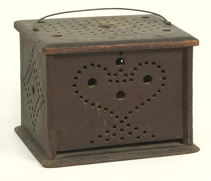 Appraisal: ANTIQUE AMERICAN WOODEN FOOT WARMER th CenturyWith pierced heart decoration