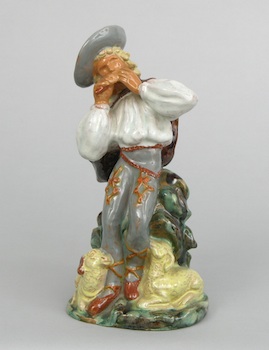 Appraisal: A Continental Ceramic Statuette Shepherd and sheep Glazed ceramic unsigned