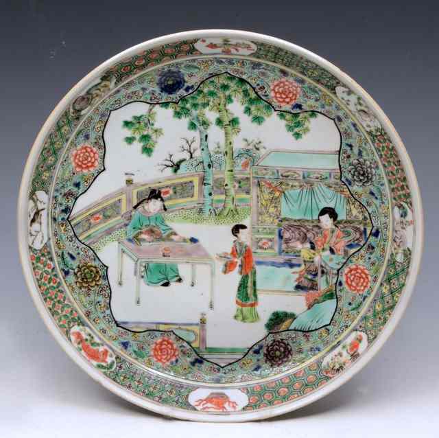 Appraisal: A CHINESE FAMILLE VERTE SHALLOW DISH decorated with figures on