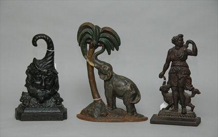 Appraisal: Three Cast-Iron Doorstops