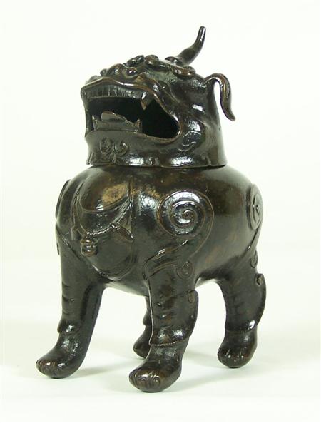 Appraisal: A Chinese th th century bronze Buddhist lion one horned