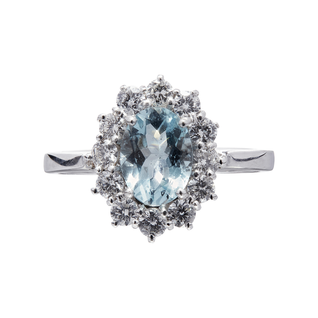 Appraisal: An aquamarine and diamond set cluster ring claw set with