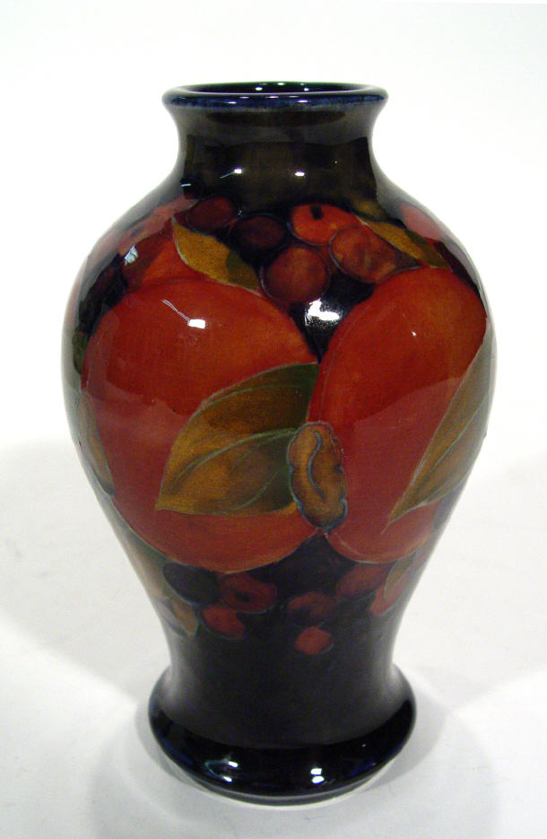 Appraisal: Moorcroft Pottery baluster vase hand painted and tube lined with