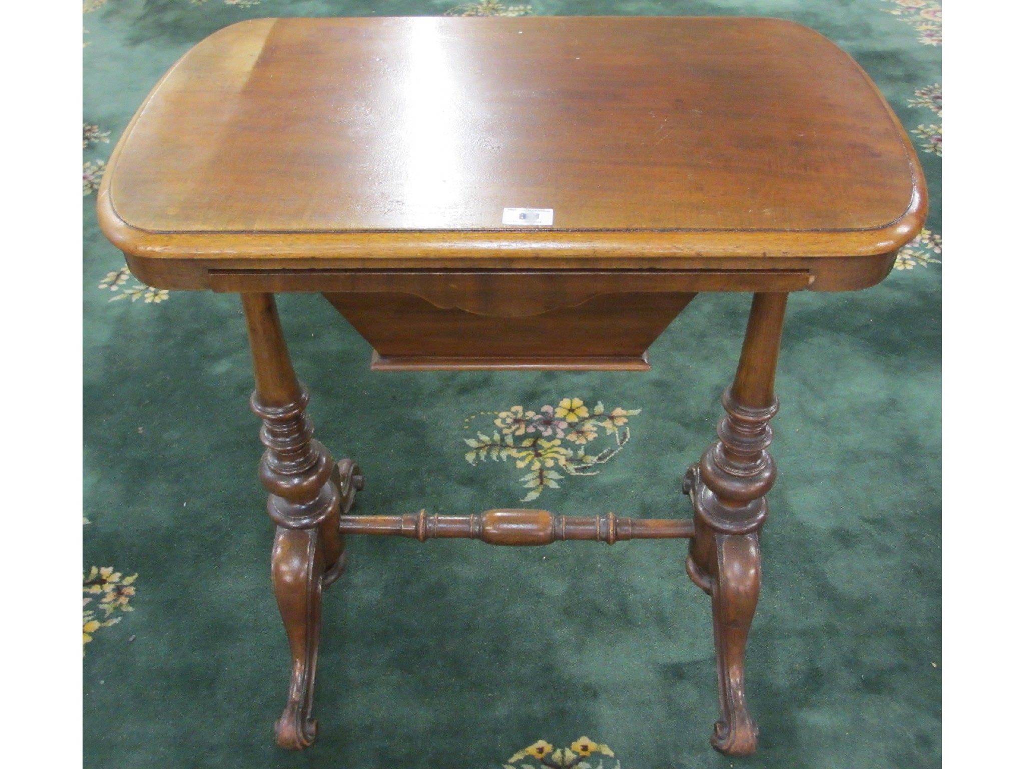 Appraisal: A Victorian mahogany sewing table