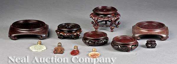 Appraisal: A Group of Seven Chinese Carved Wood Display Stands and