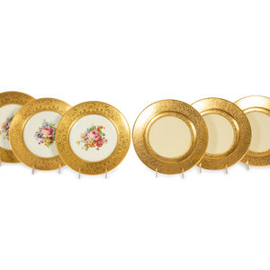 Appraisal: Two Sets of Continental Gilt-Decorated Porcelain Plates th Century comprising