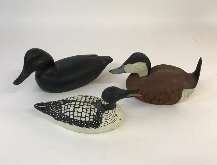 Appraisal: Three wood carved and painted ducks each signed Jim Dougherty