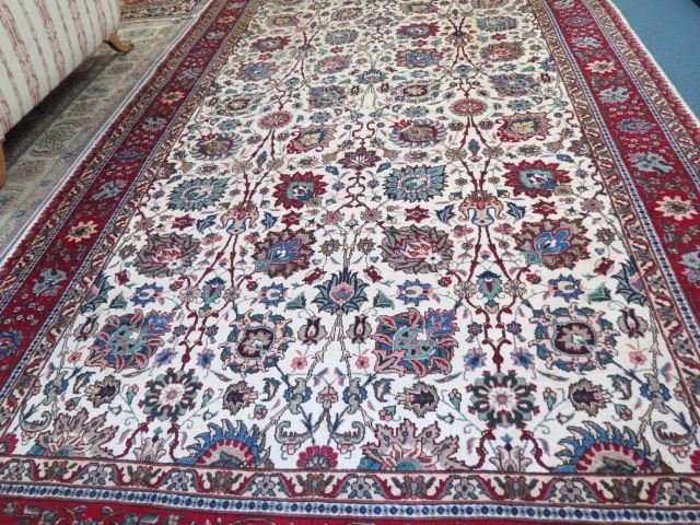 Appraisal: Tabriz Persian Handmade Room Size Rug elaborate floral ivory field