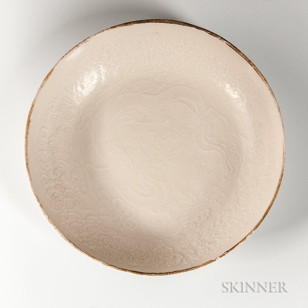 Appraisal: Cream-glazed Ding Dish Cream-glazed Ding Dish China low bowl form