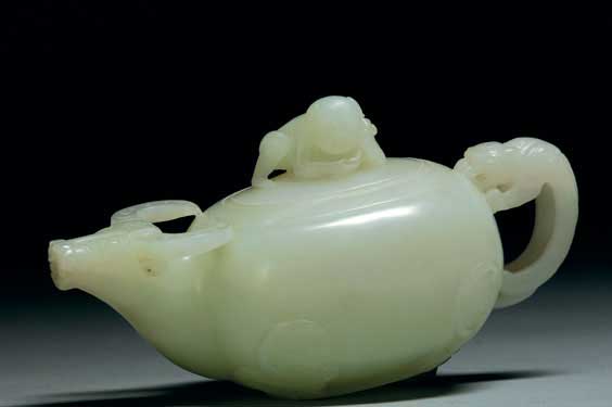 Appraisal: CARVED WHITE JADE TEAPOT Well carved Chinese white jade teapot