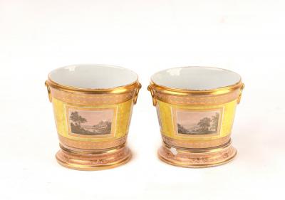 Appraisal: A pair of English porcelain cache pots circa painted with