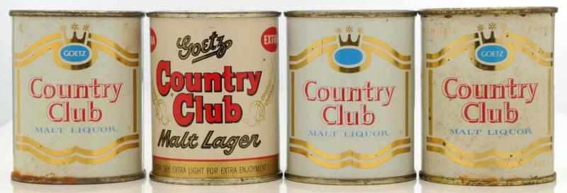 Appraisal: Country Club Flat Top Beer Cans One can is air